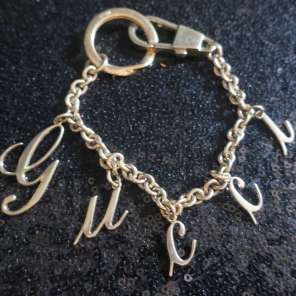 GUCCI rare gold bracelet style keychain.